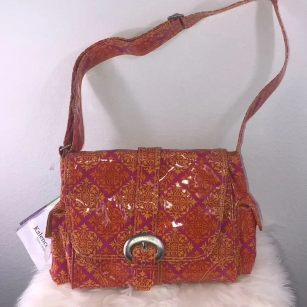 Kelencom Corp. New Orleans diaper orange bag AZO